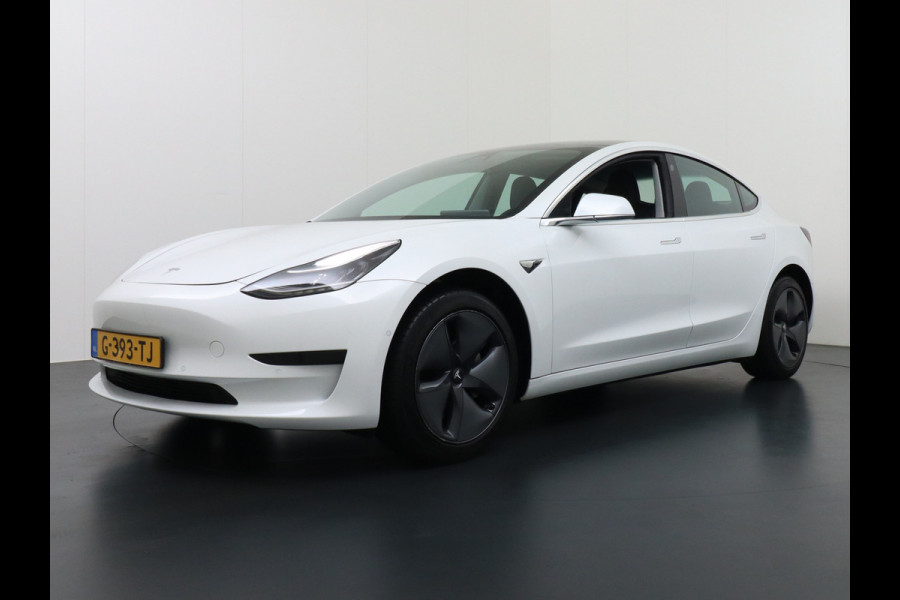 Tesla Model 3 RWD SR+ 60kWh 325PK FSD 3-Computer 18" AutoPilot Leder PanoDak Adaptive-Cruise Lmv Camera's Elektr.-Stuur+Stoelen+Spiegels+Geheu Navi LED Comfortstoelen ACC DAB Voorverwarmen interieur via App Keyless via Telefoonsleutel One-Pedal-Drive Origineel Nederlandse auto tot 11kw laden thuis! Garantie Accu tot 10-12-2027 max 160.000km 1.584kg licht!