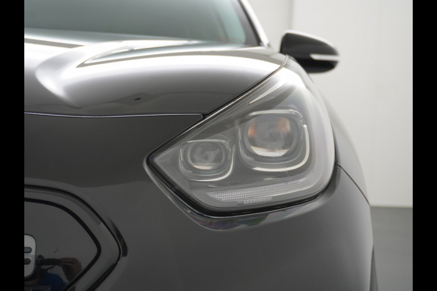 Kia e-Niro 64kWh 204PK Apple Carplay Android Auto Navi Ecc 1/2 Leder Camera Adaptieve Cruise Control Pdc Stoel Verwarming Keyless Led Stuur Verwarming Dodehoek assistent Regen-Lichtsensor Bluetooth Lmv 17" Krachtige en zuinige aandrijflijn met grote accu! €45.000 Nieuwprijs
