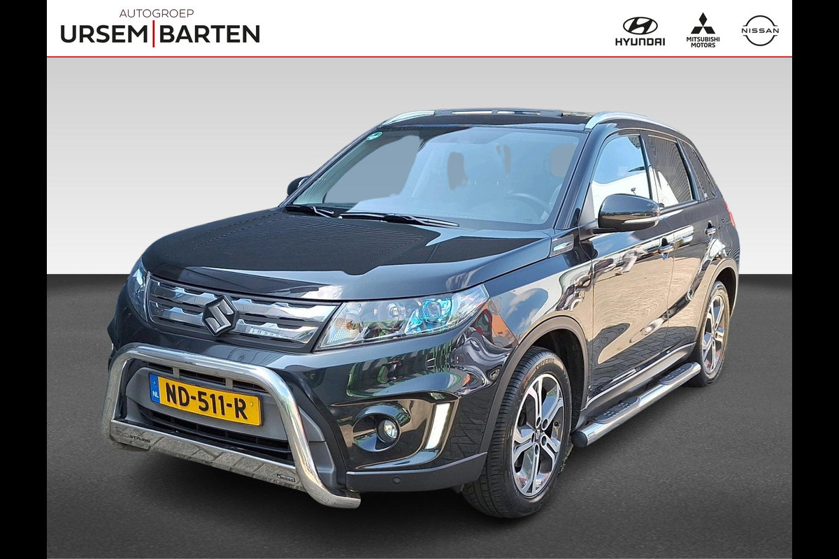 Suzuki Vitara 1.6 High Executive | Trekhaak | Schuif/ open dak | Stoelverwarming | Navi | Clima | Keyless Entry Suzuki Vitara 1.6 High Executive | Trekhaak | Schuif/ open dak | Stoelverwarming | Navi | Clima | Keyless Entry