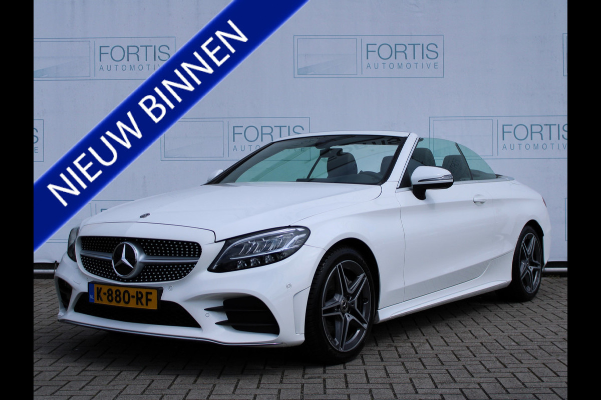 Mercedes-Benz C-Klasse Cabrio 180 Sport Edition AMG | NEKVERWARMING | STOELVERW | CAMERA | CARPLAY | DEALER ONDERHOUDEN ! Mercedes-Benz C-Klasse Cabrio 180 Sport Edition AMG | NEKVERWARMING | STOELVERW | CAMERA | CARPLAY | DEALER ONDERHOUDEN !