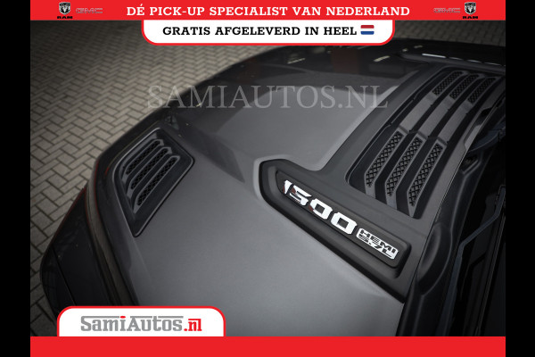 Dodge Ram 1500 SPORT | BOM VOL | 402PK HEMI 5,7 V8 | LUCHTVERING | BED SLIDE | PANO | ADAPTIVE CRUISE | 360 CAMERA | EN VEEL MEER | DUBBELE CABINE | 5 PERSOONS | LAGE KM STAND | GRANITE |