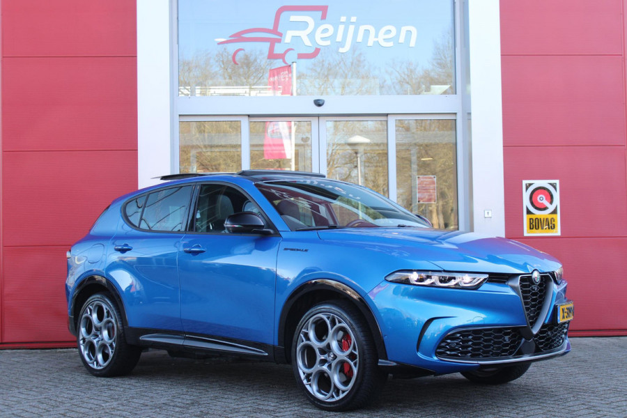 Alfa Romeo Tonale 1.3T PHEV Q4 280PK Edizione Speciale | PANORAMISCH SCHUIF / KANTELDAK | HARMAN CARDON PREMIUM AUDIO  | LEDEREN BEKLEDING | VOORSTOELEN / STUUR VERWARMD | VOORSTOELEN GEVENTILEERD | VOORSTOELEN ELEKTRISCH VERSTELBAAR MET GEHEUGEN FUNCTIE | APPLE CARPLAY / ANDROID AUTO | 360° CAMERA | DODEHOEK DETECTIE | 20"INCH LICHTMETALEN VELGEN | ADAPTIVE CRUISE CONTROL | KEYLESS ENTRY / START | ELEKTRISCH BEDIENBARE ACHTERKLEP | DRAADLOZE TELEFOONLADER | SFEER VERLICHTING | DONKERE HEMELBEKLEDING |
