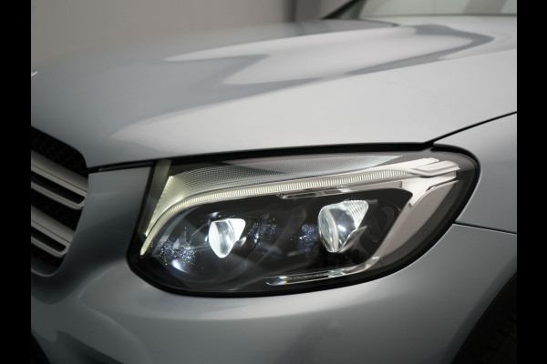Mercedes-Benz GLC 250 4MATIC Prestige AMG | Luchtvering | Adaptive Cruise | Navigatie | 360 Camera | Half Lederen Sportstoelen Verwarmd |  19'' Licht Metaal |