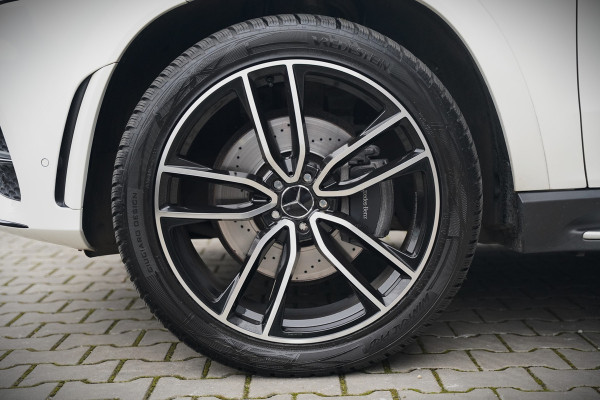 Mercedes-Benz GLE 350 D 4MATIC | Grijs Kenteken | AMG | Burmester | Adaptive Cruise Control | Stoelverwarming | Panoramadak | Luchtvering | Trekhaak | 360° Camera | BTW | Apple Carplay | Ambiance Verlichting | Leder | Nigh
