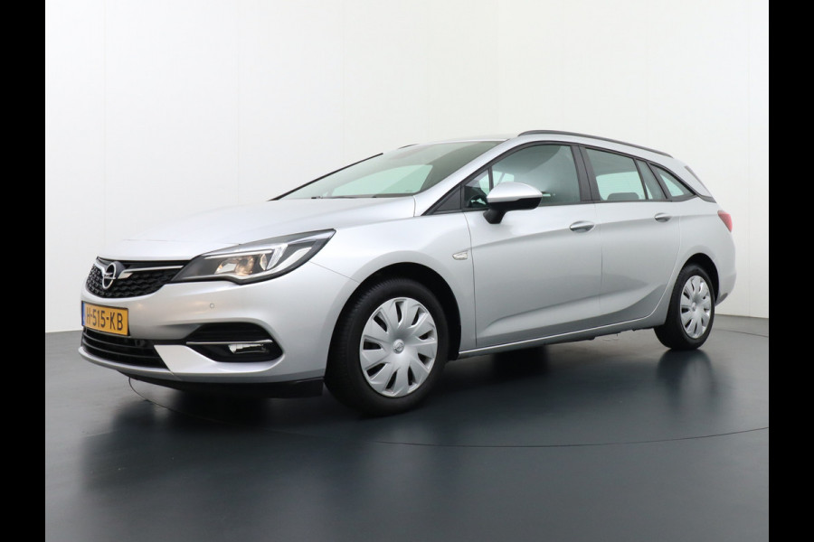 Opel Astra Sports Tourer T131PK Apple Carplay Android Auto Navi Ecc AGR-Comfort-Stoel Regen-Lichtsensor Stoel+Stuurverwarming Cruise Contro Led Winterpakket Business Edition