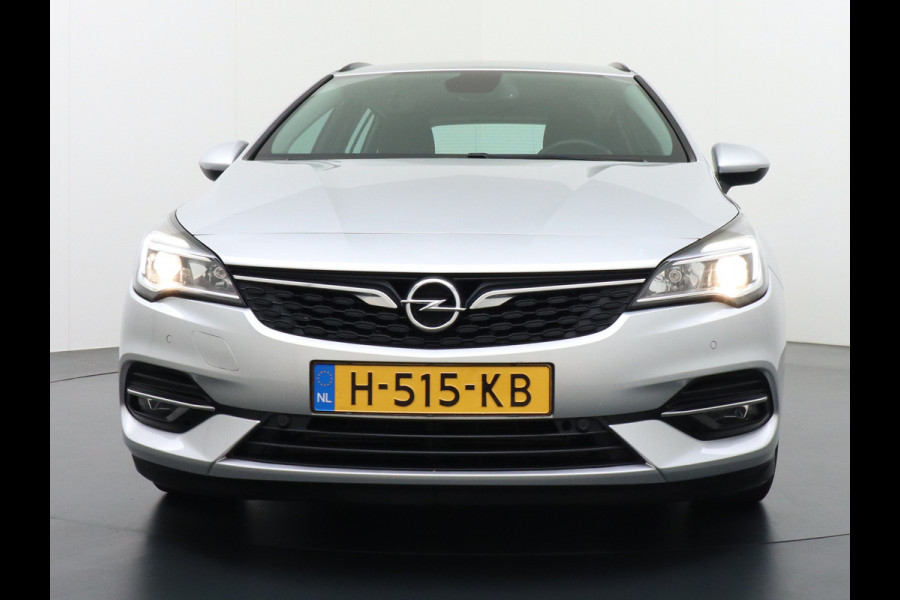 Opel Astra Sports Tourer T131PK Apple Carplay Android Auto Navi Ecc AGR-Comfort-Stoel Regen-Lichtsensor Stoel+Stuurverwarming Cruise Contro Led Winterpakket Business Edition