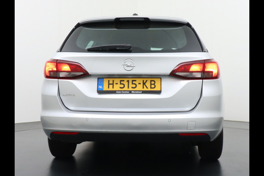 Opel Astra Sports Tourer T131PK Apple Carplay Android Auto Navi Ecc AGR-Comfort-Stoel Regen-Lichtsensor Stoel+Stuurverwarming Cruise Contro Led Winterpakket Business Edition