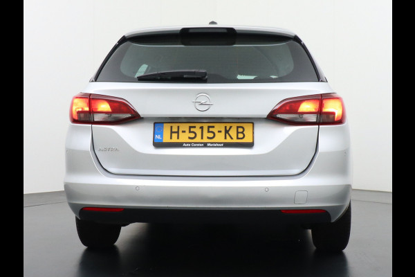 Opel Astra Sports Tourer T131PK Apple Carplay Android Auto Navi Ecc AGR-Comfort-Stoel Regen-Lichtsensor Stoel+Stuurverwarming Cruise Contro Led Winterpakket Business Edition
