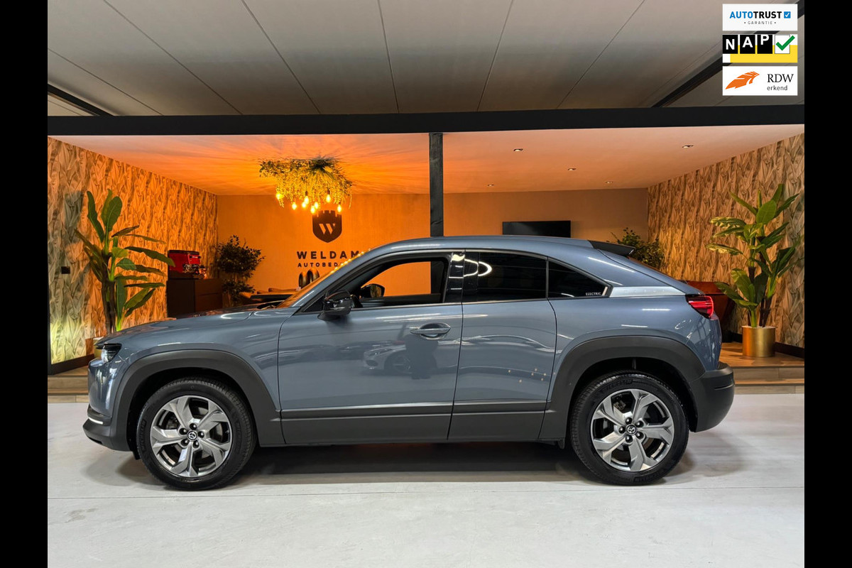 Mazda MX-30 E-SkyActiv 145 First Edition 36 kWh Garantie NAP Memory Camera StoelVW Dodehoek PDC ACC DAB Clima Navi Rijklaar Mazda MX-30 E-SkyActiv 145 First Edition 36 kWh Garantie NAP Memory Camera StoelVW Dodehoek PDC ACC DAB Clima Navi Rijklaar