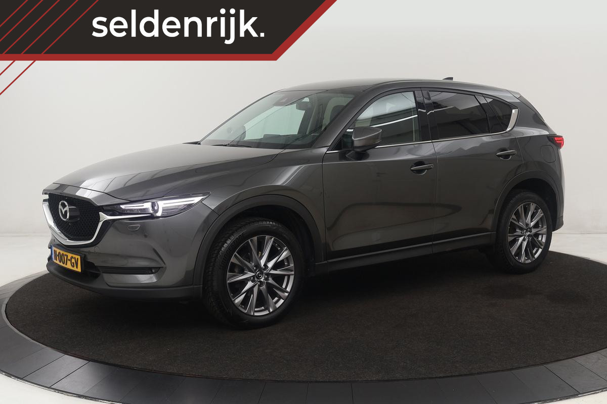 Mazda CX-5 2.0 SkyActiv-G 165 Luxury | Head-Up | Trekhaak | Leder | Stoel & stuurverwarming | 360 camera | Carplay | BOSE Sound | Full LED | Keyless | Memory | Achterbankverwarming Mazda CX-5 2.0 SkyActiv-G 165 Luxury | Head-Up | Trekhaak | Leder | Stoel & stuurverwarming | 360 camera | Carplay | BOSE Sound | Full LED | Keyless | Memory | Achterbankverwarming