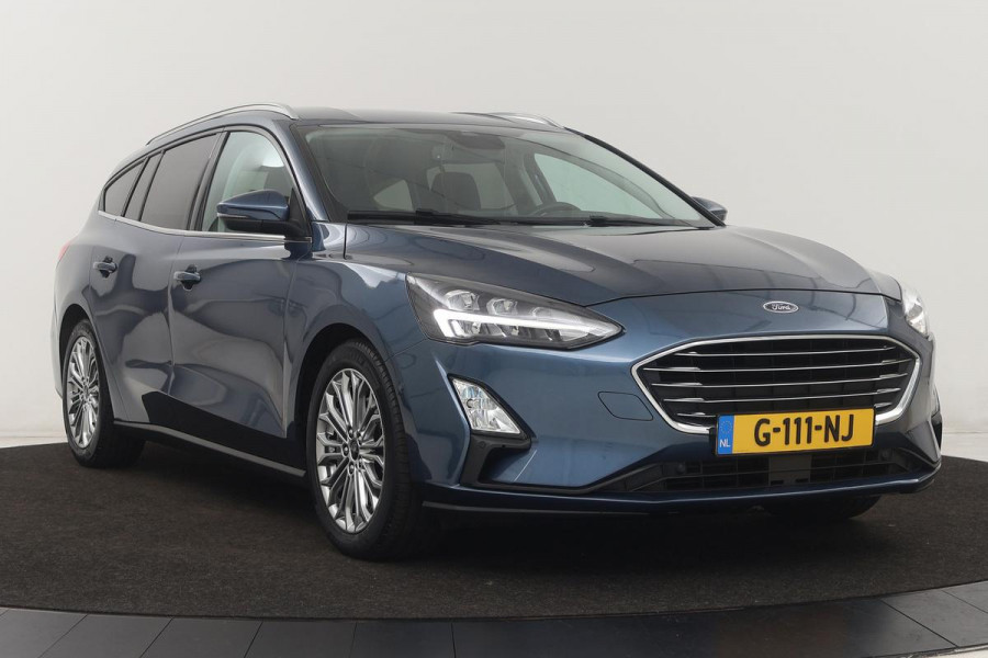 Ford Focus 1.5 EcoBoost Titanium | Stoel & stuurverwarming | Adaptive cruise | Full LED | Camera | Trekhaak | Carplay | Climate control