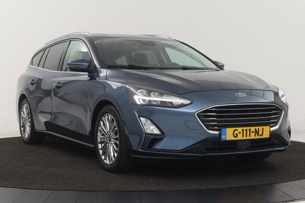 Ford Focus 1.5 EcoBoost Titanium | Stoel & stuurverwarming | Adaptive cruise | Full LED | Camera | Trekhaak | Carplay | Climate control