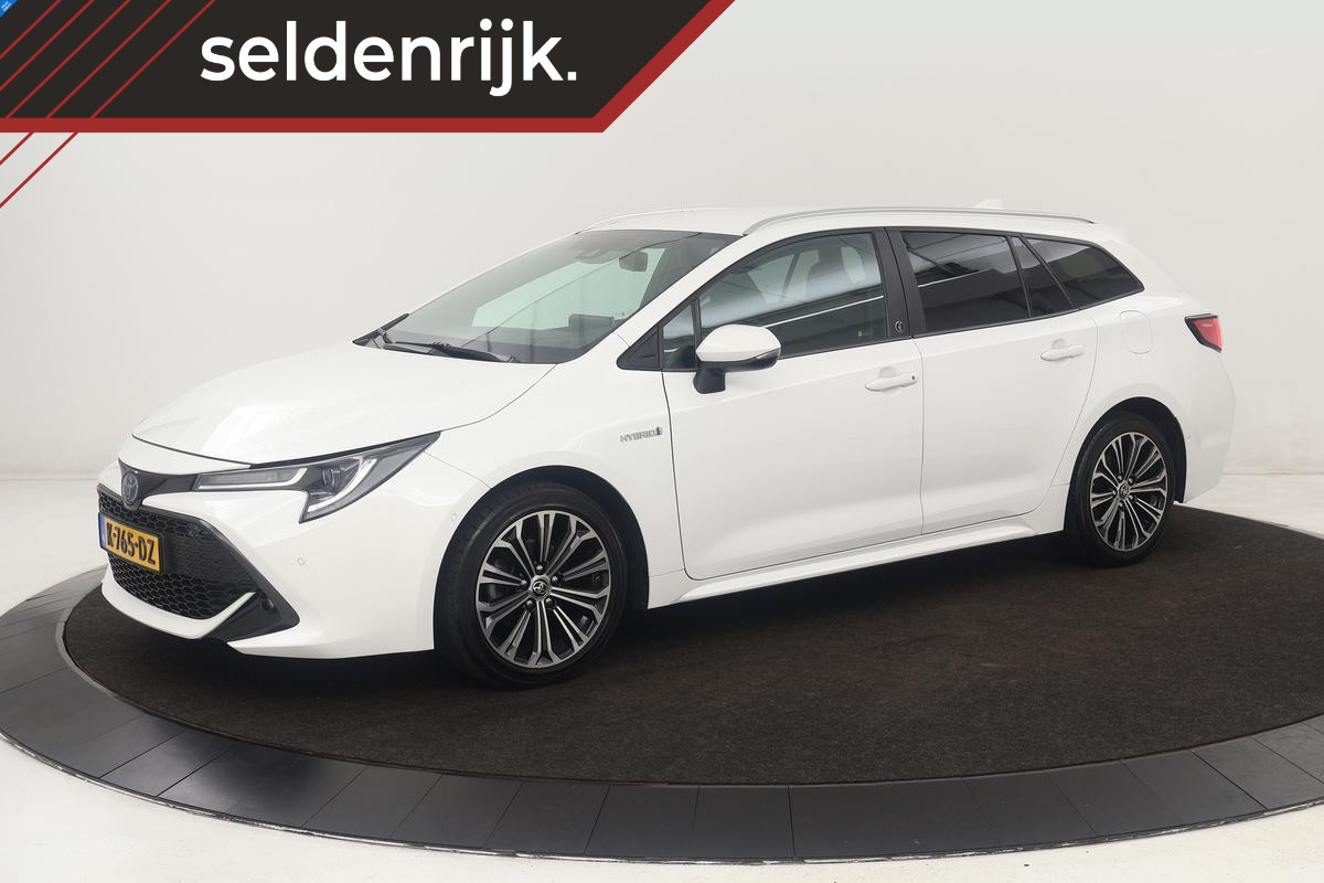 Toyota Corolla 1.8 Hybrid Business Plus | Stoelverwarming | Trekhaak | Adaptive cruise | Camera | Carplay | Full LED | Navigatie | Climate control | Stuurverwarning Toyota Corolla 1.8 Hybrid Business Plus | Stoelverwarming | Trekhaak | Adaptive cruise | Camera | Carplay | Full LED | Navigatie | Climate control | Stuurverwarning