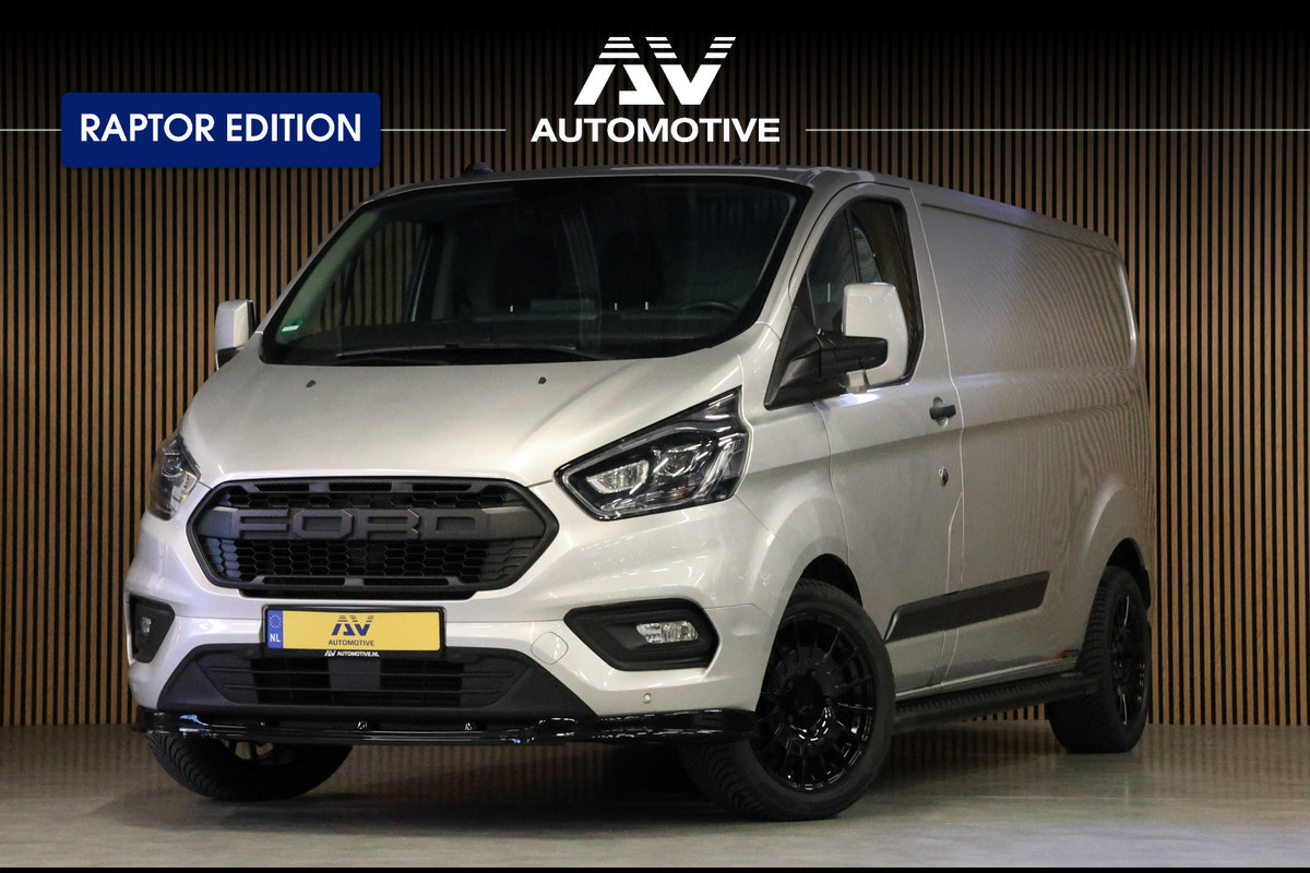 Ford Transit Custom 320 2.0 TDCI L2H1 Raptor Edition | Bi-Xenon | CarPlay | Navigatie | Camera | Stoelverwarming | Dodehoek detector | DAB | Werkplaatsinrichting | 3-Zitter | Dealer onderhouden | Nieuwe APK Ford Transit Custom 320 2.0 TDCI L2H1 Raptor Edition | Bi-Xenon | CarPlay | Navigatie | Camera | Stoelverwarming | Dodehoek detector | DAB | Werkplaatsinrichting | 3-Zitter | Dealer onderhouden | Nieuwe APK