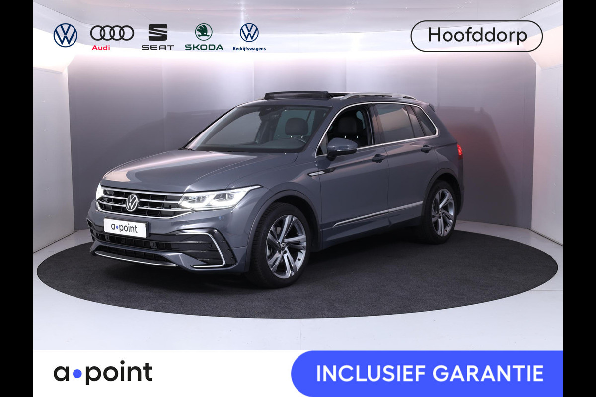 Volkswagen Tiguan 1.5 TSI R-Line Business+ 150pk |Panoramadak | Elekt. trekhaak | Leer| Camera| Adaptieve cruise control | Volkswagen Tiguan 1.5 TSI R-Line Business+ 150pk |Panoramadak | Elekt. trekhaak | Leer| Camera| Adaptieve cruise control |