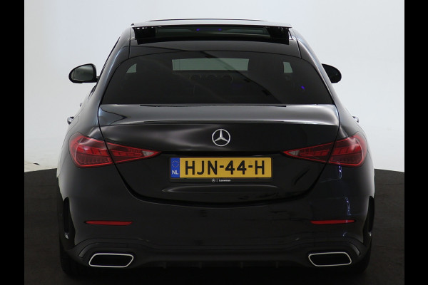 Mercedes-Benz C-Klasse 300 e AMG Plug-In Hybride | Panoramadak | Lichtmetalen velgen | Parking support met camera achter | Navigatie | Inclusief 24 maanden MB Certified garantie voor Europa.