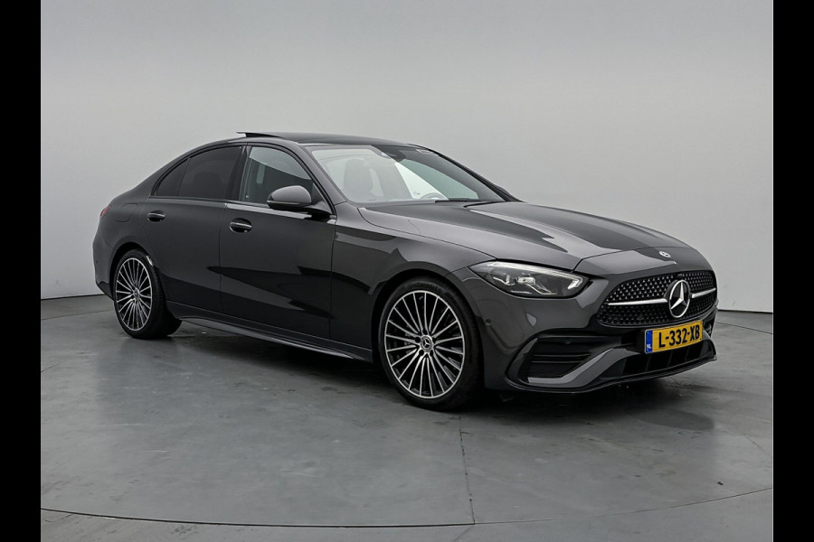 Mercedes-Benz C-Klasse 200 Launch Edition AMG Line | Multispaaks lichtmetalen velgen | Panoramadak | Navigatie | Parking support met camera achter | Inclusief 24 maanden MB Certified garantie voor Europa.