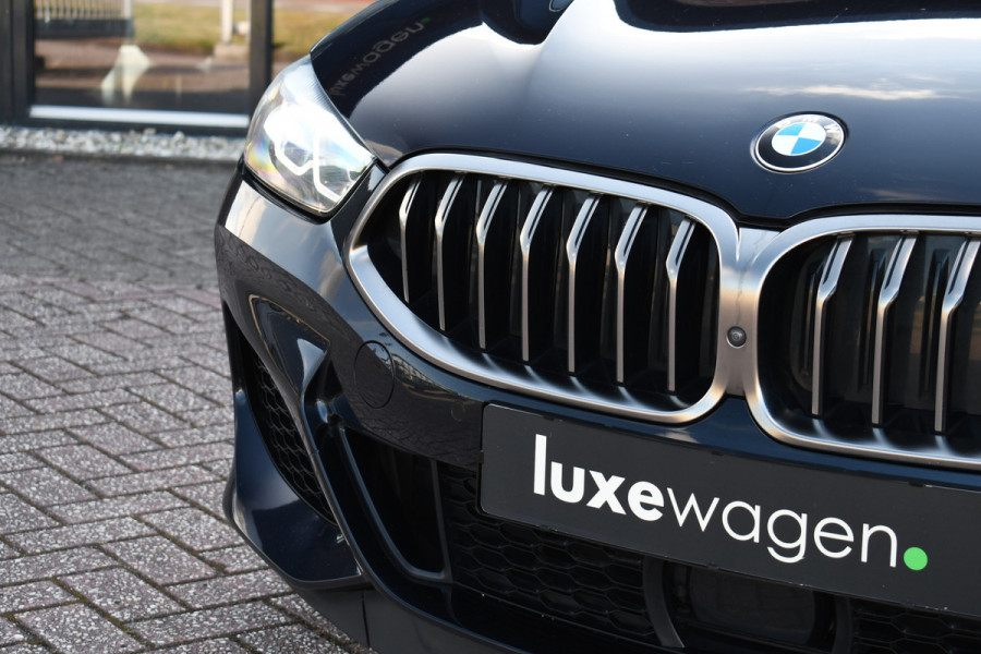 BMW 8 Serie M850i xDrive B&W Stoelvent Soft-Close ACC 360 HUD 4WS
