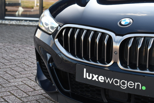 BMW 8 Serie M850i xDrive B&W Stoelvent Soft-Close ACC 360 HUD 4WS