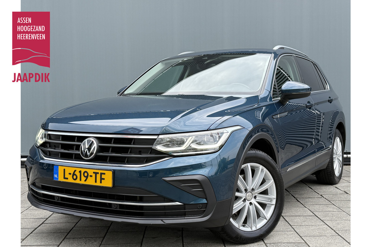 Volkswagen Tiguan BWJ 2021 |1.5 TSI 150PK Elegance AUTOMAAT | LEER | CAMERA | TREKHAAK | CRUISE | NAVI | STOELVERW | CARPLAY Volkswagen Tiguan BWJ 2021 |1.5 TSI 150PK Elegance AUTOMAAT | LEER | CAMERA | TREKHAAK | CRUISE | NAVI | STOELVERW | CARPLAY