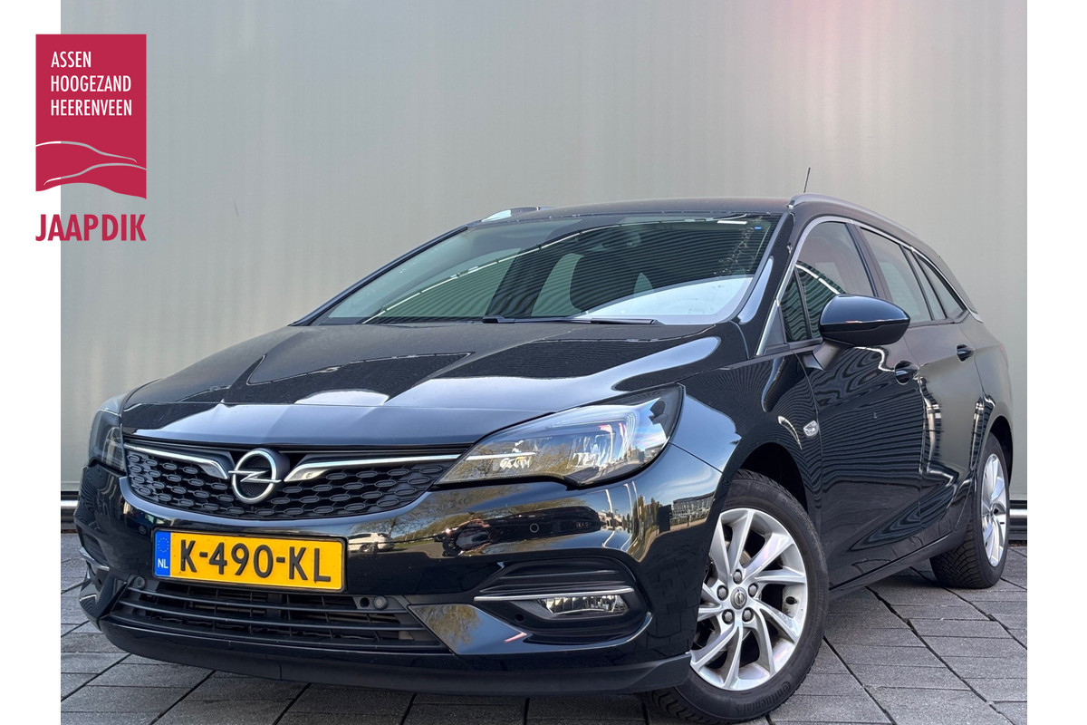 Opel Astra Sports Tourer BWJ 2021 | 1.2 111PK Business Elegance | CLIMA | CAMERA | TREKHAAK | CARPLAY | NAVI | CRUISE | Opel Astra Sports Tourer BWJ 2021 | 1.2 111PK Business Elegance | CLIMA | CAMERA | TREKHAAK | CARPLAY | NAVI | CRUISE |