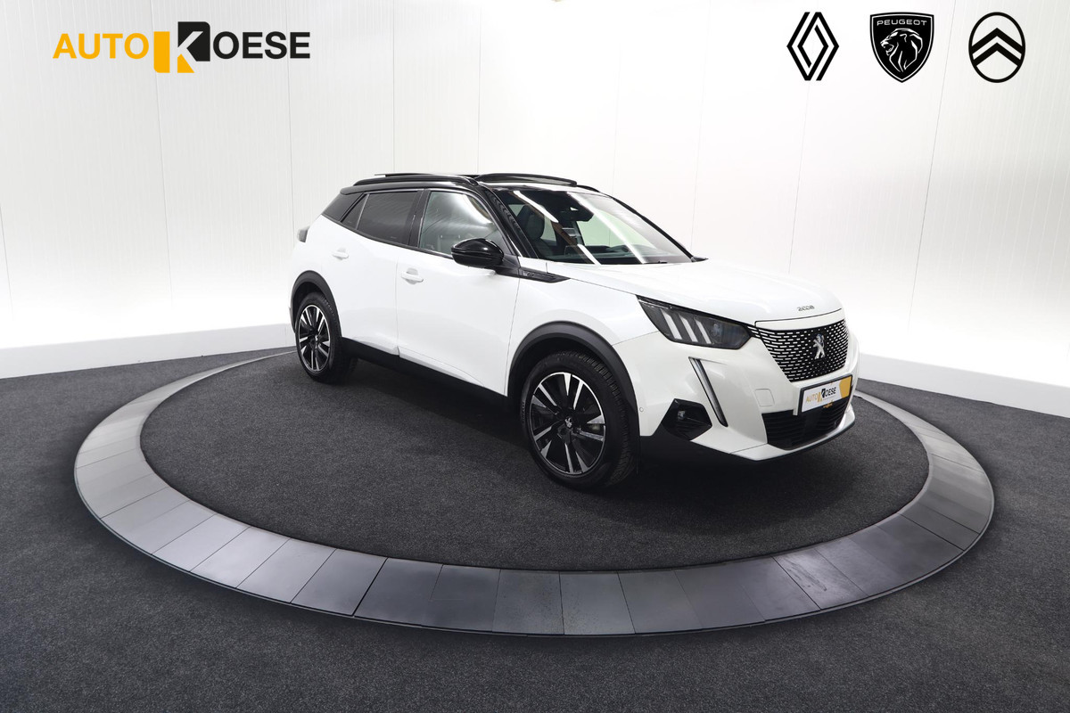 Peugeot e-2008 EV GT Pack 50 kWh | Schuif-/Kanteldak | Adaptieve Cruise Control | Camera | Dodehoekdetectie Peugeot e-2008 EV GT Pack 50 kWh | Schuif-/Kanteldak | Adaptieve Cruise Control | Camera | Dodehoekdetectie