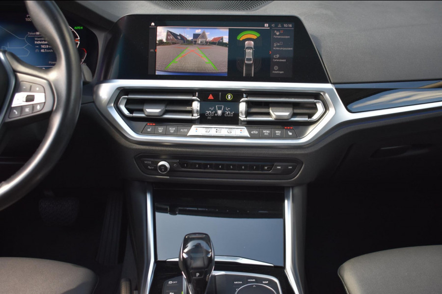 BMW 3-serie 320i High Executive | HARMAN KARDON | SCHUIF KANTELDAK | LEDER | STOELVERWARMING | SFEERVERLICHTING | APPLE CARPLAY