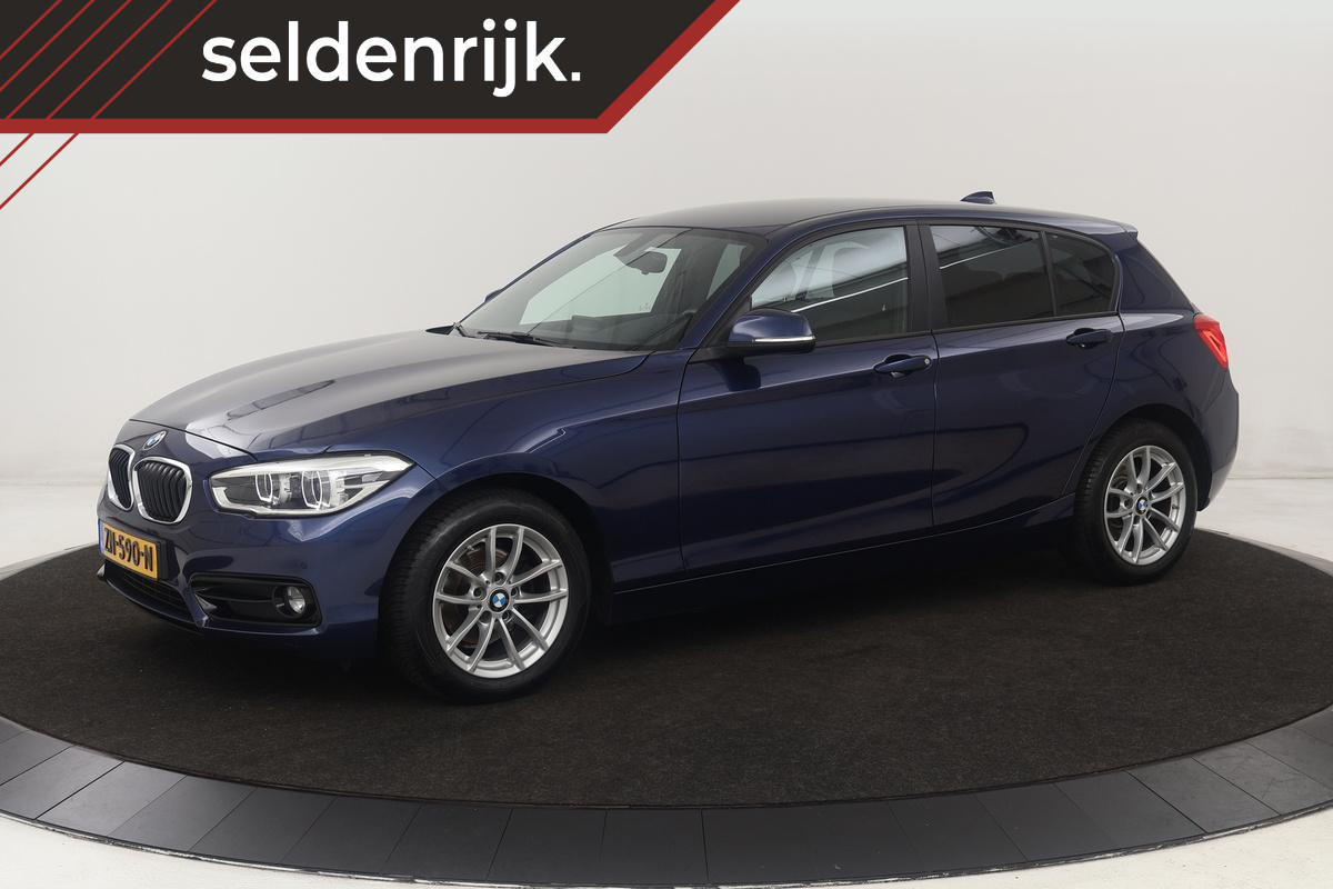 BMW 1-serie 118i Sport Line Edition | Full LED | Sportstoelen | Navigatie | Climate control | Parkeerhulp | Cruise control BMW 1-serie 118i Sport Line Edition | Full LED | Sportstoelen | Navigatie | Climate control | Parkeerhulp | Cruise control