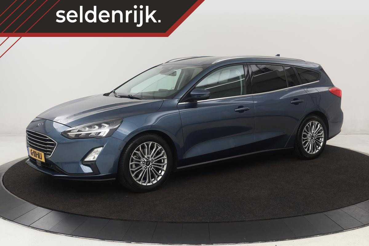 Ford Focus 1.5 EcoBoost Titanium | Stoel & stuurverwarming | Adaptive cruise | Full LED | Camera | Trekhaak | Carplay | Climate control Ford Focus 1.5 EcoBoost Titanium | Stoel & stuurverwarming | Adaptive cruise | Full LED | Camera | Trekhaak | Carplay | Climate control
