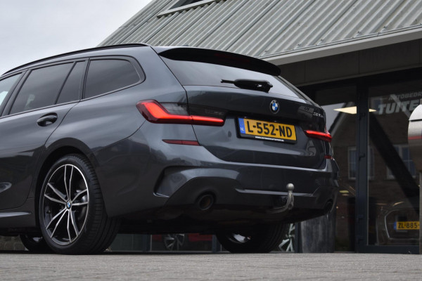 BMW 3 Serie Touring 320e M-SPORT | SHADOW-LINE | EL. WEGKL. TREKHAAK | HEAD-UP DISPLAY | APPLE CARPLAY | ANDROID AUTO | LEDER