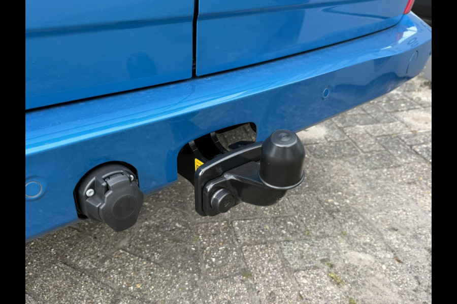 Ford Transit Custom 300 2.0 TDCI L2H1 Limited DC 136pk | SCI | Dubbele Cabine | Digital Aqua Blue | Trekhaak | Dubbele Schuifdeur | Bijrijdersstoel | Sidesteps | Bumperpakket | Zwarte velgen  | Stoelverwarming | Camera