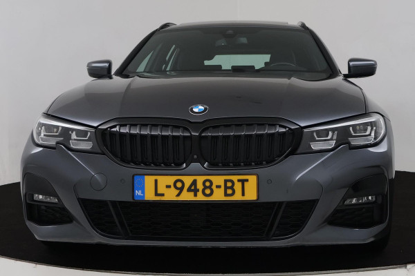 BMW 3 Serie Touring 320i High Executive (PANORAMADAK, TREKHAAK WEGKLAPBAAR, CAMERA, NAVIGATIE, NL-AUTO, DEALER ONDERHOUDEN)