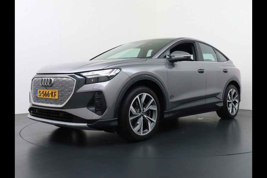 Audi Q4 Sportback e-tron 40 204pk 77kWh Adap.Cruise Sport-St. 20" Apple Carplay Android Camera Navi Matrix Led Elek.Achterklep Trekhaak Ecc Stoelverwarmi Audi sound system Assistentiepakketten-Parking/Tour/Plus 1e Eigenaar Origineel Nederlandse Auto 1.000kg trekvermogen € 63.000nieuw