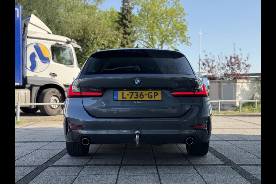 BMW 3 Serie Touring 318d Aut. 150pk Bus. Exe Ed. | Navi | ECC | Trekhaak |