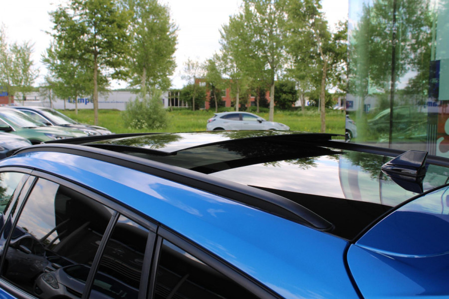 Ford Focus 2.0 EcoBlue 150pk ST-Line X Wagon | Panoramadak | Adaptive LED | Adaptive cruise control | 18 inch met rode remklauwen | Adaptive LED | Half lederen bekleding | Winter Pack | Camera