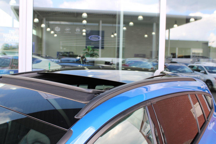 Ford Focus 2.0 EcoBlue 150pk ST-Line X Wagon | Panoramadak | Adaptive LED | Adaptive cruise control | 18 inch met rode remklauwen | Adaptive LED | Half lederen bekleding | Winter Pack | Camera