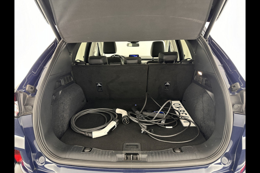 Ford Kuga 2.5 PHEV Titanium X (INCL-BTW) *LEATHER-MICROFIBRE | FULL-LED | DIGI-COCKPIT | ADAPTIVE-CRUISE | BLINDSPOT | PARK-PILOT | CAMERA | NAVI-FULLMAP | HEATED-COMFORT-SEATS | CARPLAY | DAB | LANE-ASSIST | 17"ALU*