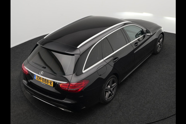 Mercedes-Benz C-Klasse Estate 180 Business Solution AMG Plus Upgrade Edition | Multibeam LED | Virtual | Apple Carplay | Afneembare Trekhaak | Alcantara Sportstoelen Verwarmd | Sfeerverlichting | Camera | 18"L.M |