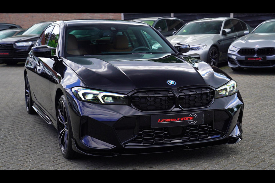 BMW 3-serie 330e xDrive M-pakket | BMW LED | Adaptieve Cruise | Camera | Harman/Kardon | Carbon | Driving Assistant | Active Guard