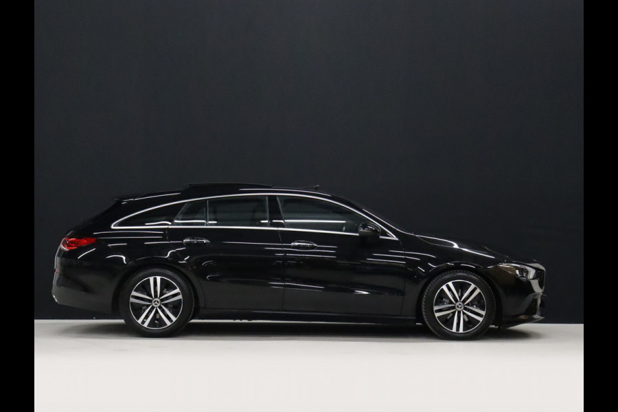 Mercedes-Benz CLA-Klasse Shooting Brake 200 Business Solution Luxury [CARPLAY, CRUISE CONTROL,SCHUIFKANTELDAK,  SFEERVERLICHTING, DIGITAL DASH, TREKHAAK, MEMORY SEATS, STOELVERWARMING, CAMERA + PDC, MERCEDES-BENZ KOPLAMPEN, VOL LEDER, NAVIGATIE, NIEUWSTAAT]
