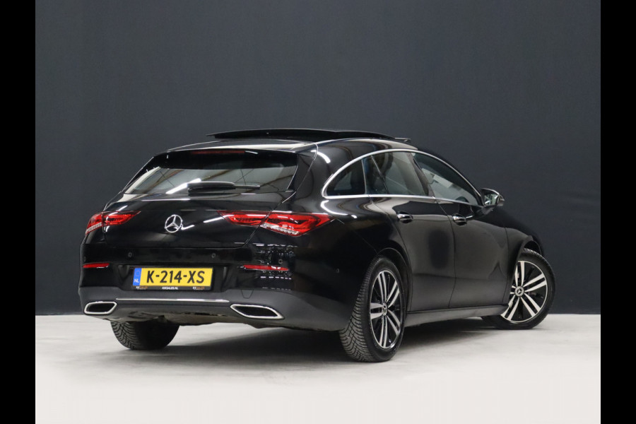 Mercedes-Benz CLA-Klasse Shooting Brake 200 Business Solution Luxury [CARPLAY, CRUISE CONTROL,SCHUIFKANTELDAK,  SFEERVERLICHTING, DIGITAL DASH, TREKHAAK, MEMORY SEATS, STOELVERWARMING, CAMERA + PDC, MERCEDES-BENZ KOPLAMPEN, VOL LEDER, NAVIGATIE, NIEUWSTAAT]