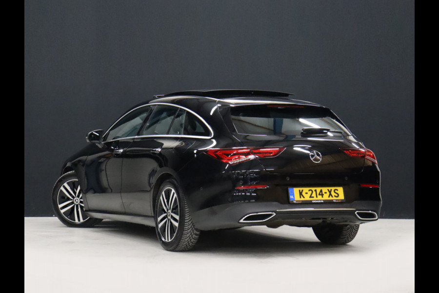 Mercedes-Benz CLA-Klasse Shooting Brake 200 Business Solution Luxury [CARPLAY, CRUISE CONTROL,SCHUIFKANTELDAK,  SFEERVERLICHTING, DIGITAL DASH, TREKHAAK, MEMORY SEATS, STOELVERWARMING, CAMERA + PDC, MERCEDES-BENZ KOPLAMPEN, VOL LEDER, NAVIGATIE, NIEUWSTAAT]
