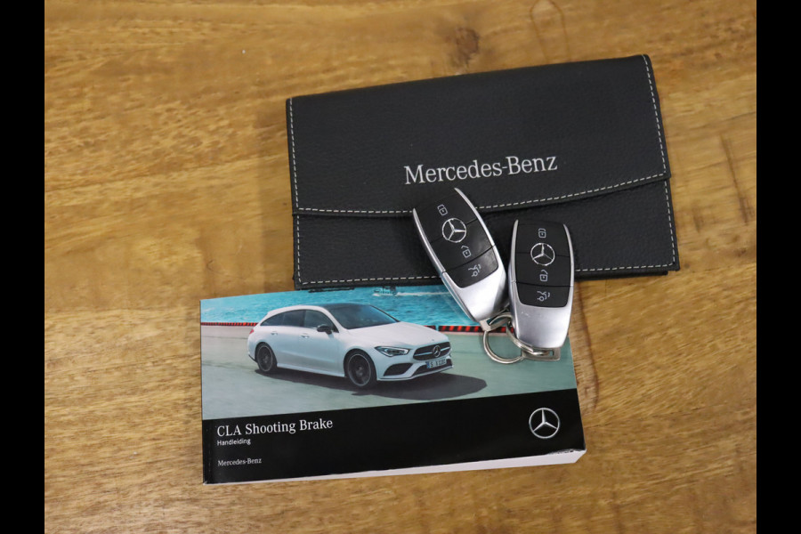 Mercedes-Benz CLA-Klasse Shooting Brake 200 Business Solution Luxury [CARPLAY, CRUISE CONTROL,SCHUIFKANTELDAK,  SFEERVERLICHTING, DIGITAL DASH, TREKHAAK, MEMORY SEATS, STOELVERWARMING, CAMERA + PDC, MERCEDES-BENZ KOPLAMPEN, VOL LEDER, NAVIGATIE, NIEUWSTAAT]