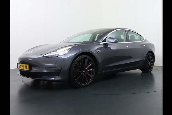Tesla Model 3 Performance AWD 513pk 0-100 in 3,4 sec! Lmv-20" FSD-Comp.3 AutoPilot Carbon-Spoiler Premium-HiFi Pano.dak Camera Leer Adaptive-C Camera Navi LED ACC DAB Voorverwarmen interieur en Keyless via App One-Pedal-Drive Rode Remklauwen Origineel Nederlandse auto! Nieuwprijs €65.680 Garantie op Accu/Motor tot 21-12-2027 max 192.000km