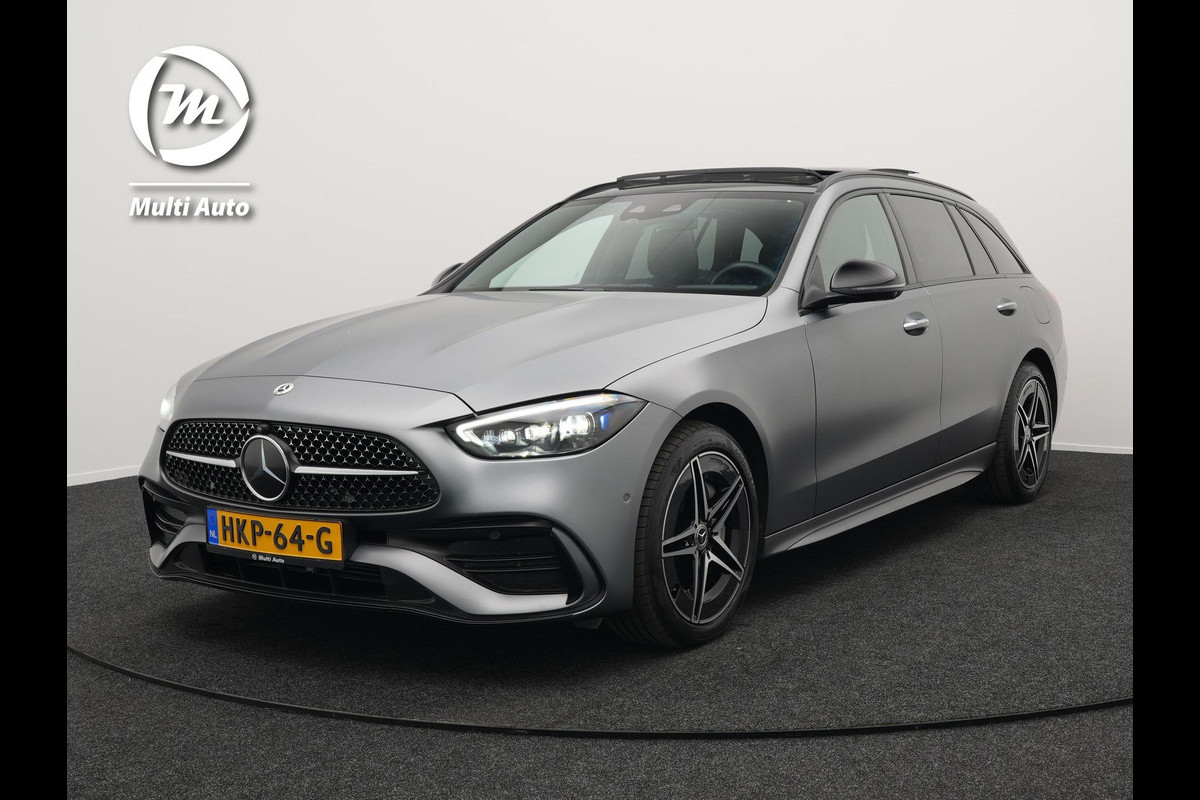Mercedes-Benz C-Klasse Estate 300 e AMG Line Plug in Hybrid Selenite Magno PHEV | Panodak | Trekhaak af Fabriek | Adaptive Cruise | Elektrische Stoelen met Memory | Carplay | Sfeerverlichting | MBUX | Navigatie | 360 Camera | DAB | Virtual | Mercedes-Benz C-Klasse Estate 300 e AMG Line Plug in Hybrid Selenite Magno PHEV | Panodak | Trekhaak af Fabriek | Adaptive Cruise | Elektrische Stoelen met Memory | Carplay | Sfeerverlichting | MBUX | Navigatie | 360 Camera | DAB | Virtual |