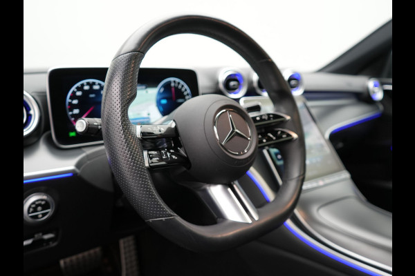 Mercedes-Benz C-Klasse Estate 300 e AMG Line Plug in Hybrid Selenite Magno PHEV | Panodak | Trekhaak af Fabriek | Adaptive Cruise | Elektrische Stoelen met  Memory | Carplay | Sfeerverlichting | MBUX | Navigatie | 360 Camera | DAB | Virtual |