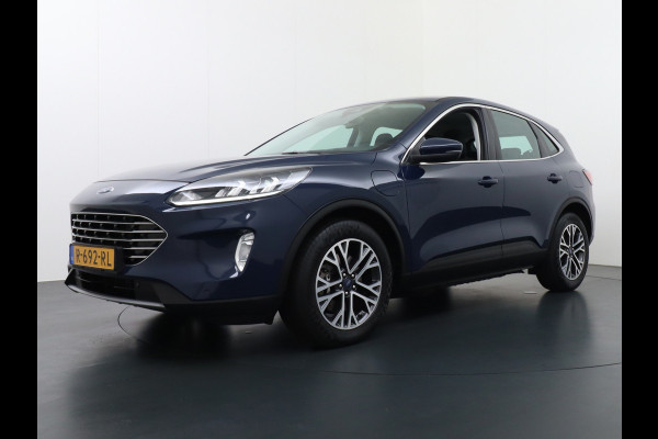 Ford Kuga 2.5 PHEV 225pk Aut. Hybride Navi Camera Apple Carplay Android Ford-Connect PDC a+v 18" DAB Dual-ECC Stoelverwarmd Cruise Control Led Bluetooth Active Braking/Pre-Collision Assist Lane Assist en Road Edge Detection Voicecontrol EURO 6