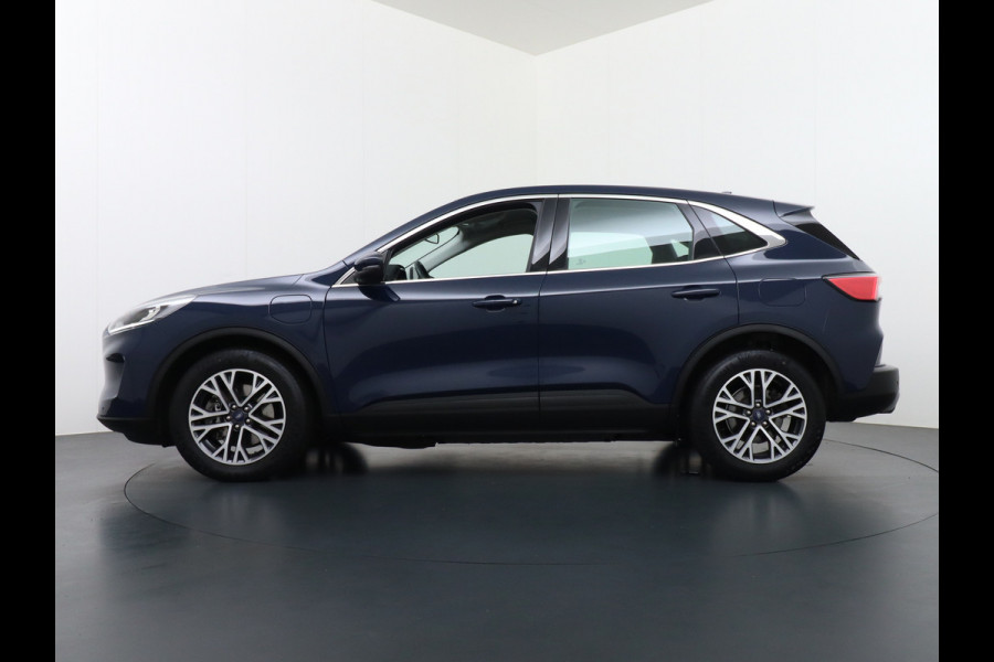 Ford Kuga 2.5 PHEV 225pk Aut. Hybride Navi Camera Apple Carplay Android Ford-Connect PDC a+v 18" DAB Dual-ECC Stoelverwarmd Cruise Control Led Bluetooth Active Braking/Pre-Collision Assist Lane Assist en Road Edge Detection Voicecontrol EURO 6