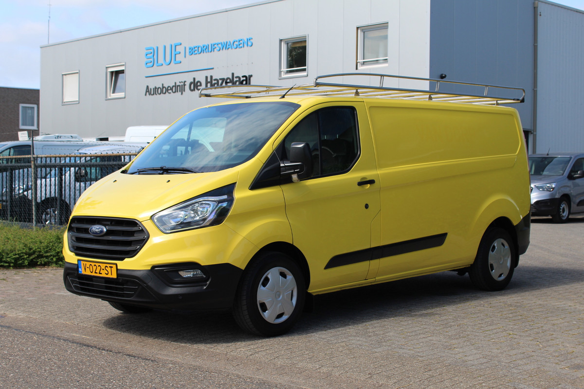 Ford Transit Custom 340 2.0 TDCI 130PK Euro6 L2H1 Trend ✓ imperiaal ✓ trekhaak 2800KG ✓ Bott inbouwkasten Ford Transit Custom 340 2.0 TDCI 130PK Euro6 L2H1 Trend ✓ imperiaal ✓ trekhaak 2800KG ✓ Bott inbouwkasten