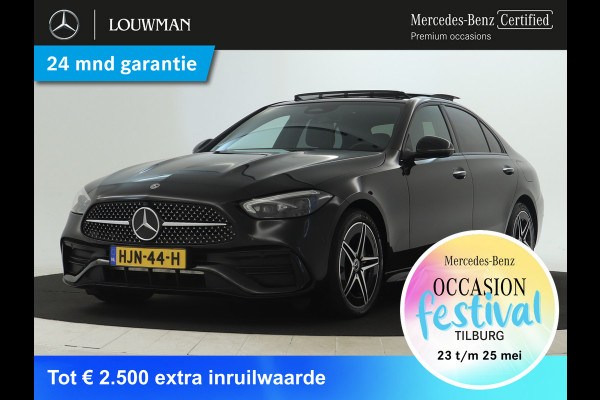 Mercedes-Benz C-Klasse 300 e AMG Plug-In Hybride | Panoramadak | Lichtmetalen velgen | Parking support met camera achter | Navigatie | Inclusief 24 maanden MB Certified garantie voor Europa.